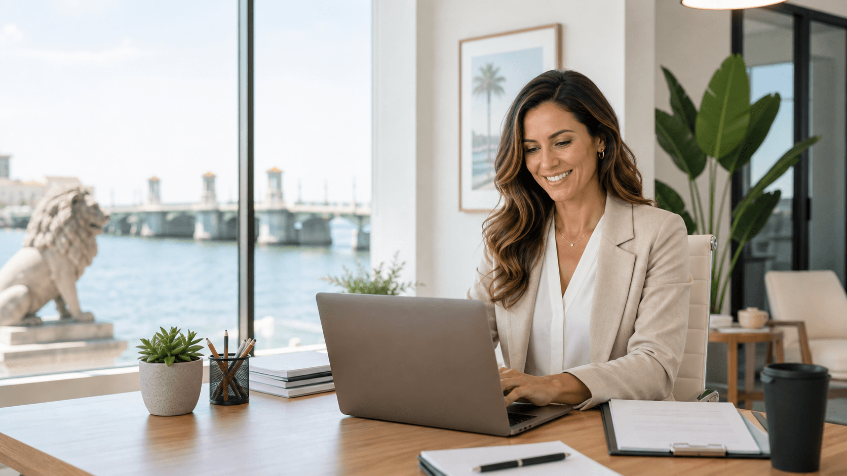 Local business owner reviewing search visibility and AI answer engine content on a laptop.